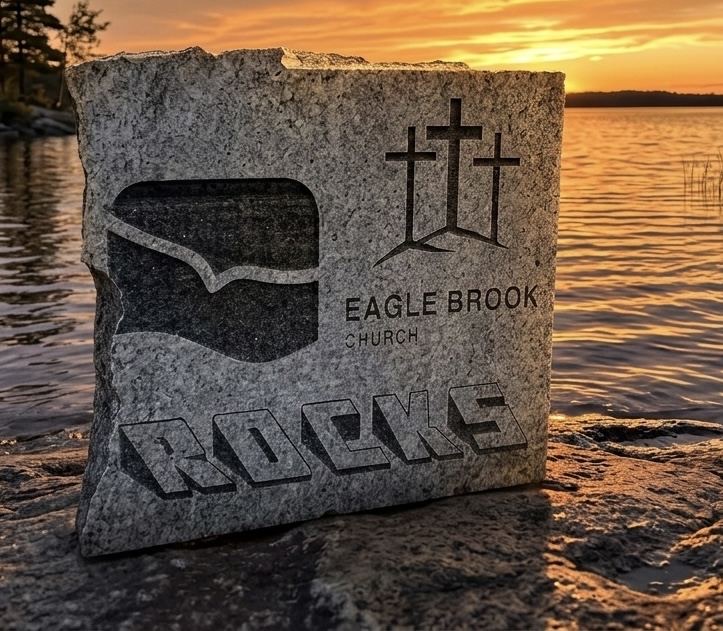 Engraved granite stone on Lake Superior at sunset