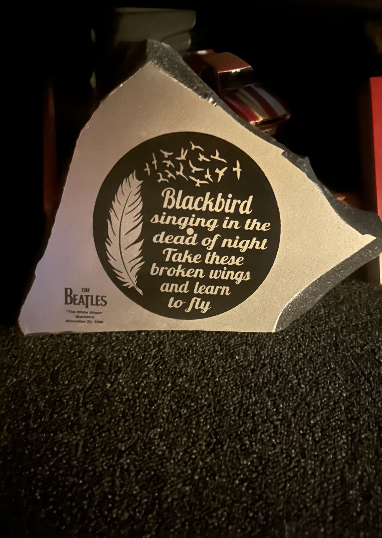 Beatles Blackbird lyric engraved on stone